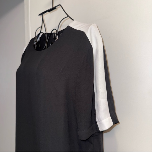 BCBGMaxAzria Black Cutout Back Short Sleeve Blouse - Picture 4 of 9